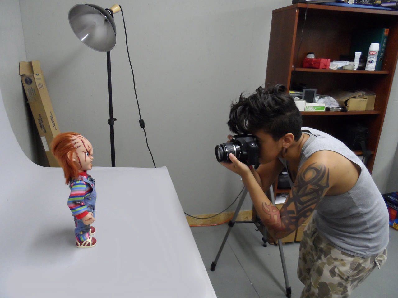 Mezco intern Dehlia Arce  photographs Mezco Mega Chucky for a magazine article