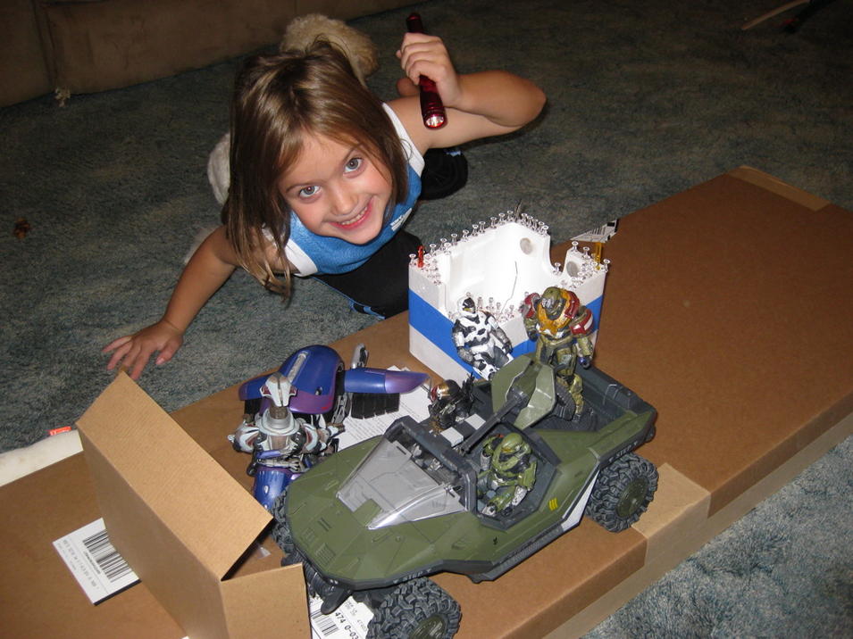 Daughter with Halo toys