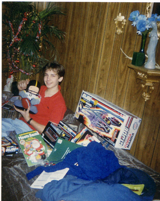 12.87 Doug w Christmas presents