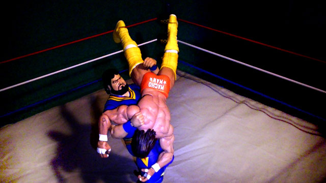 Akeem bodyslams Savage like a ragdoll!