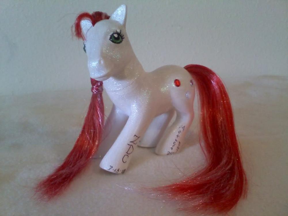 A mother's day present I made for Mastersteef mother. Hair, body, eyes, writing, and gems all added and hand painted.