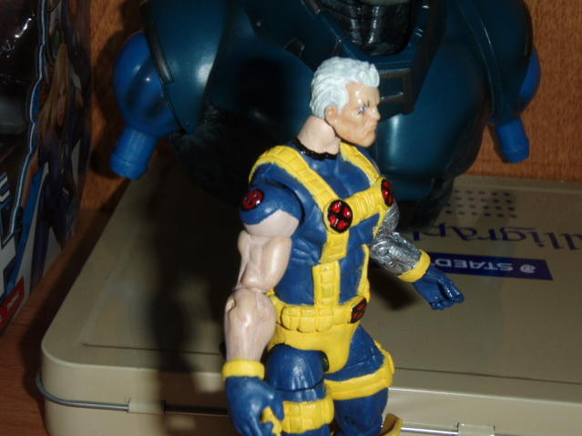 ingraved x on shoulder pad