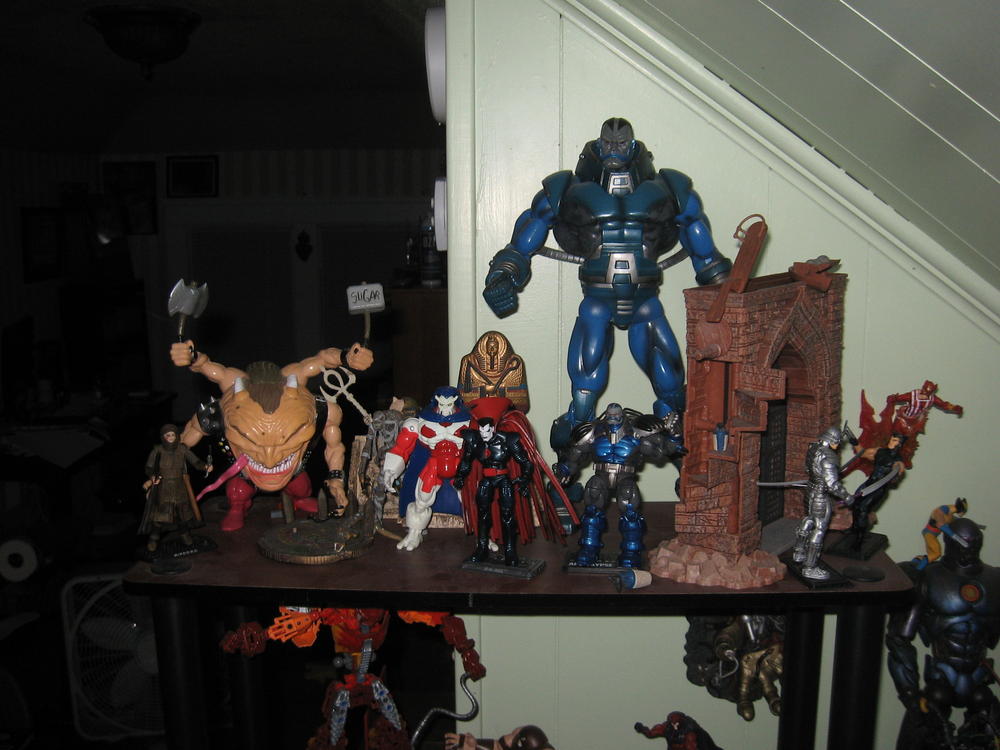Silver Sameri, wolvie, Sunfire, Prince of persia wall, MU Apocalypse, Legends BAF Apocalypse, Mcfarlane monsters Mummy playset, Mr. Sinister, Toybiz Caliban as Death, Sugar Man, PoP bad guy.

I'm going with Caliban, PoP scarface guy, Mummy, and sugar man for my four horsemen. Death, Pestilence, famine, and war, in that order.

Any objects you can't I.D. come from the McFarlane Mummy Playset.