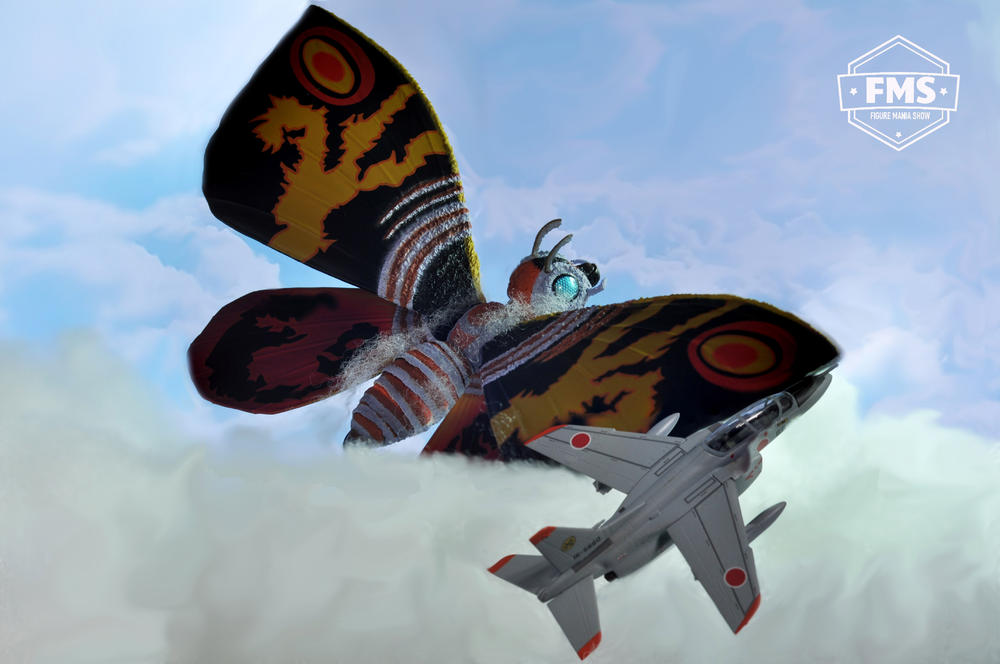 Mothra flying Above the clouds